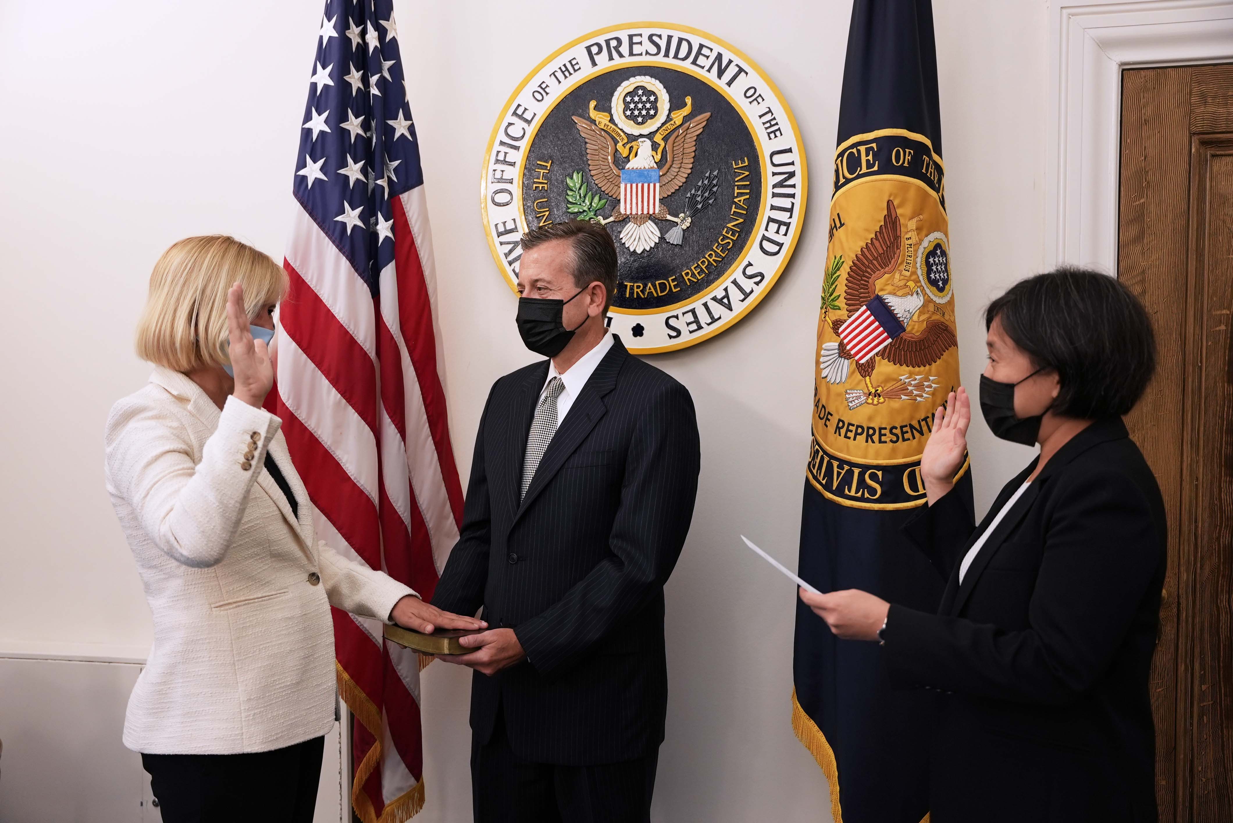 Sarah Bianchi gets sworn in by Ambassador Tai.